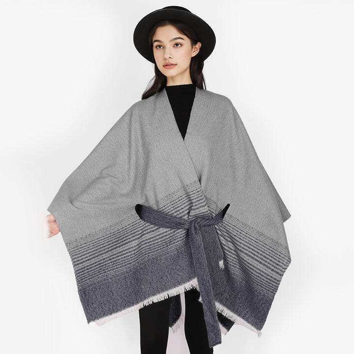 Ladies wrap poncho made of fine knit with tie belt and fringed hem Mune Fashion