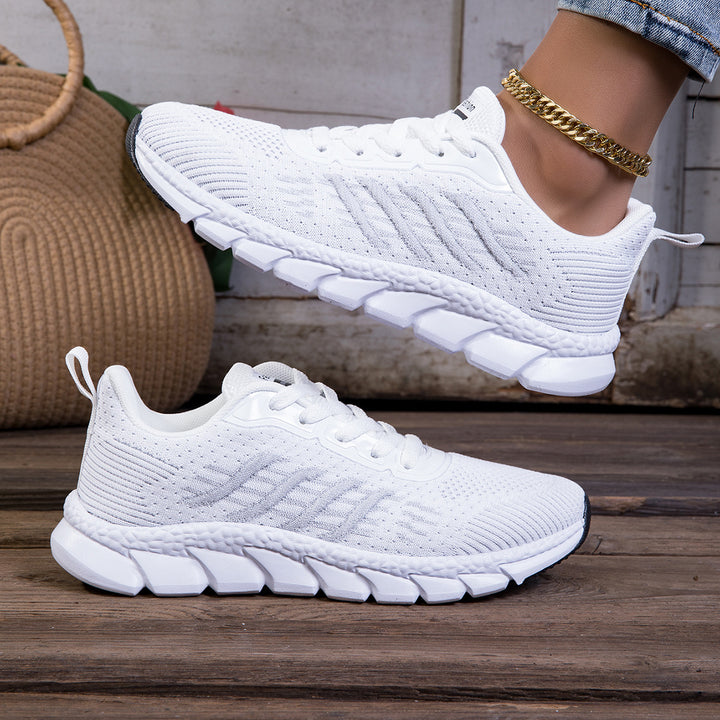 Women's knitted slip-on sneakers with elastic shaft, decorative lacing, and segmented cushioning sole Mune Fashion