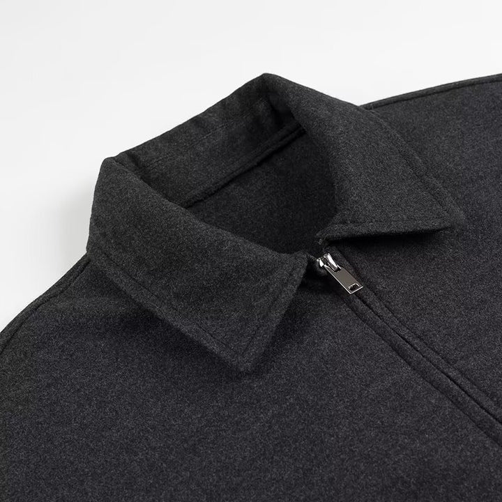 Women's tailored cropped blouson jacket in shirt collar style with concealed zipper front and large appliquéd pockets Mune Fashion