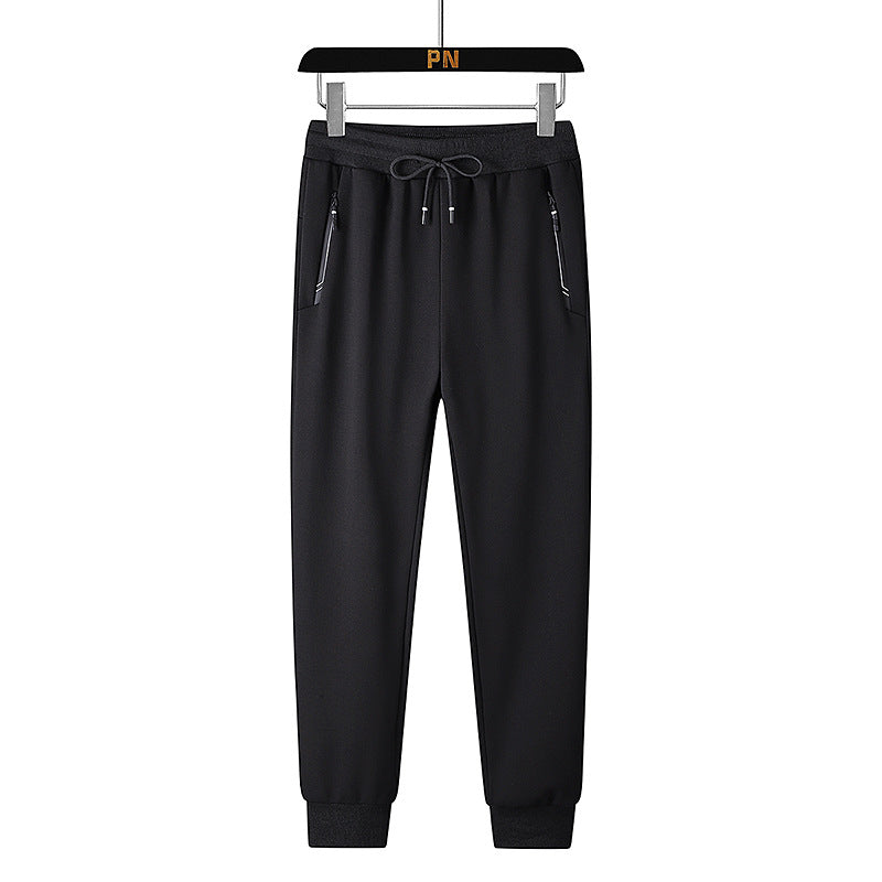 Men's thermo fleece jogging pants with brushed inner side, reflective zipper pockets and drawstring waistband Mune Fashion