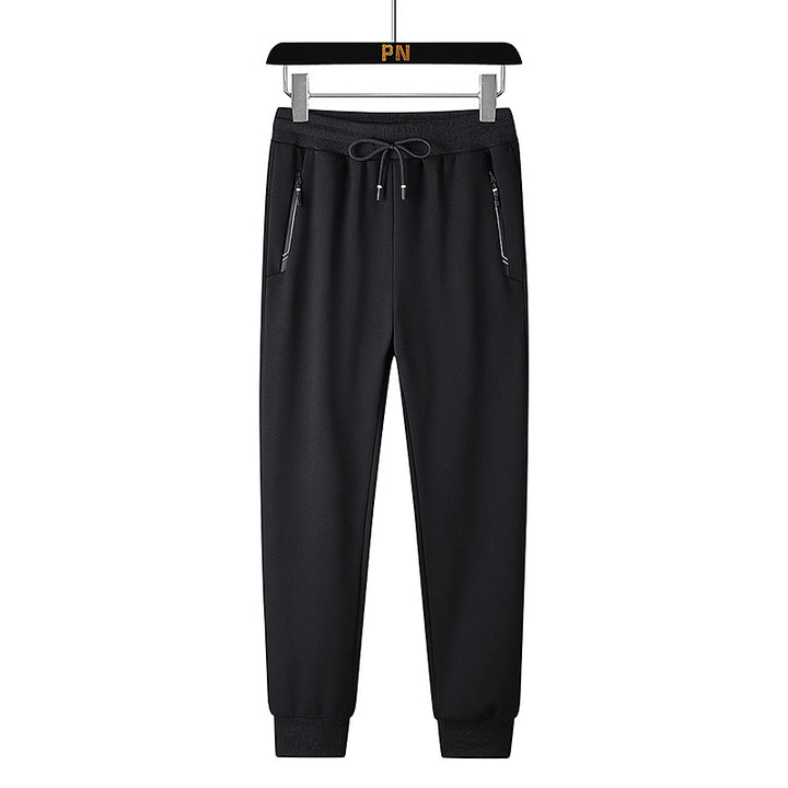 Men's thermo fleece jogging pants with brushed inner side, reflective zipper pockets and drawstring waistband Mune Fashion