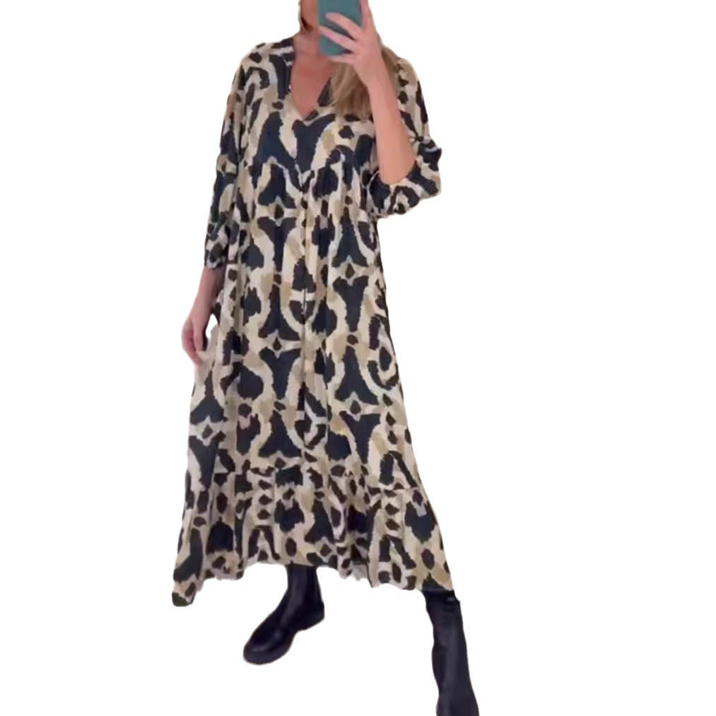 Women's flowing tiered maxi dress with V-neck, gathered bust panel and three-quarter sleeves Mune Fashion