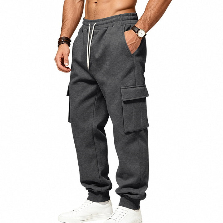 Men's loose-fitting cargo joggers with elastic waistband and large flap pockets Mune Fashion