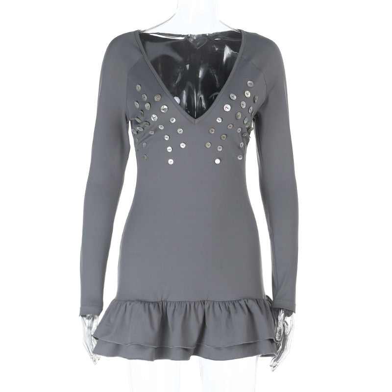Women's figure-hugging long sleeve mini dress with deep V-neckline, sequin appliqué and ruffle hem Mune Fashion