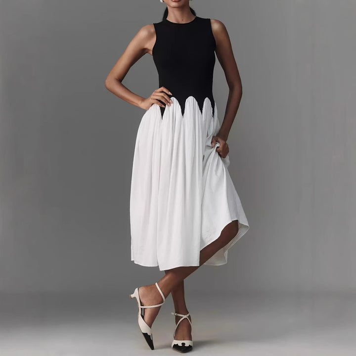 Women’s sleeveless midi dress with fitted ribbed top and flowing tiered skirt Mune Fashion