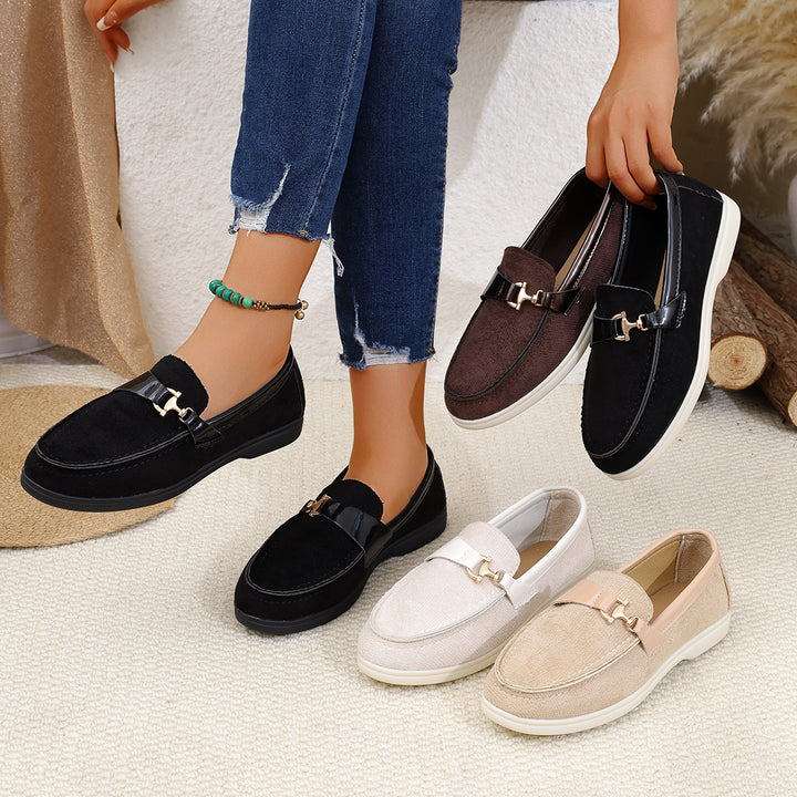 Ladies elegant suede slippers with decorative metal hardware and flexible easy-running sole Mune Fashion