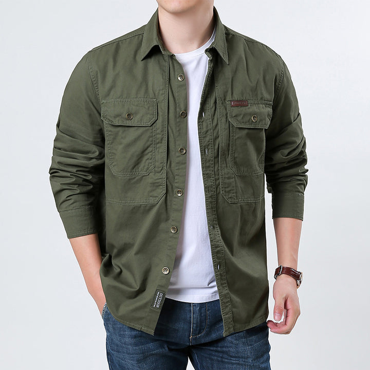 Men's casual utility shirt jacket made of cotton twill with two patch breast pockets and buttonable front.