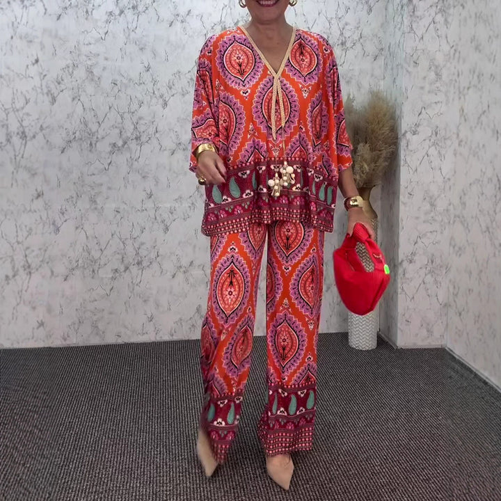 Ladies relaxed tunic and palazzo pants set with V-neck fringe band and wide leg Mune Fashion