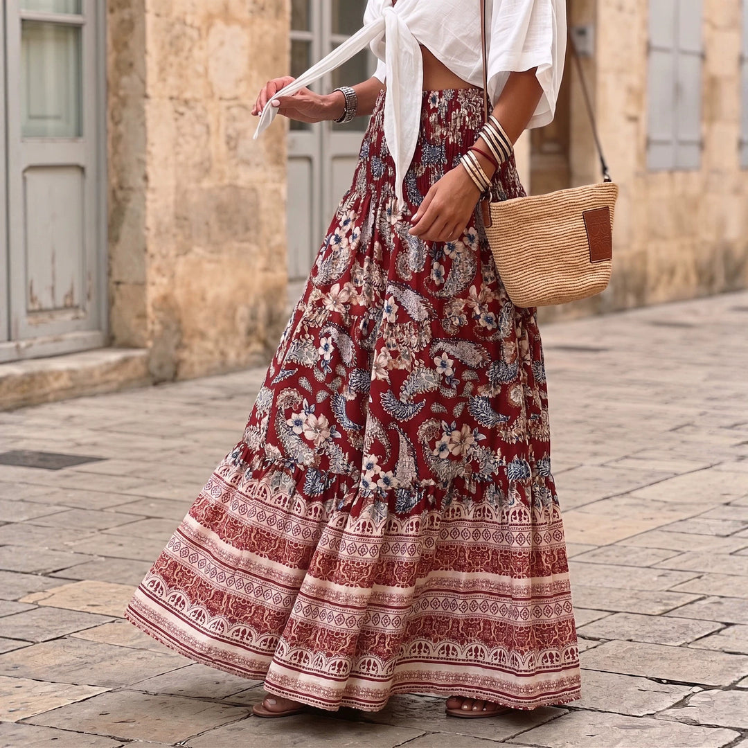 Women's layered maxi skirt with floral print, elastic smocked waistband and ruffle edges Mune Fashion