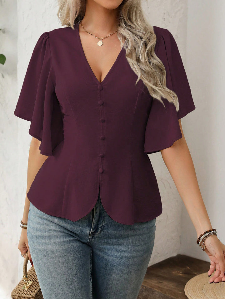 Ladies V-neck tailored blouse with peplum and flounce sleeves Mune Fashion