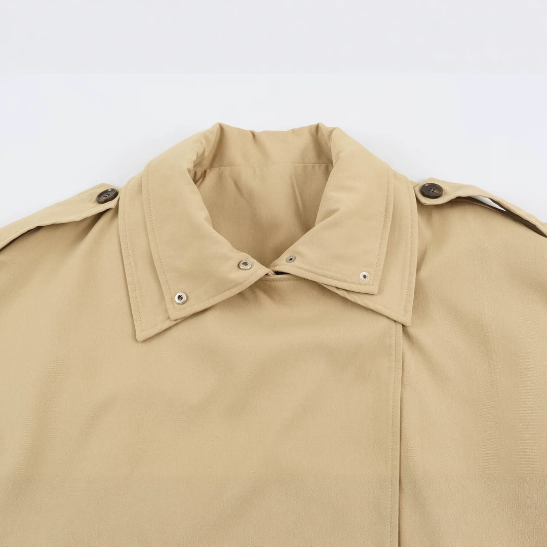 Women's short trench coat in oversized cut with double button placket and shoulder straps Mune Fashion
