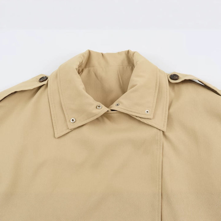Women's short trench coat in oversized cut with double button placket and shoulder straps Mune Fashion