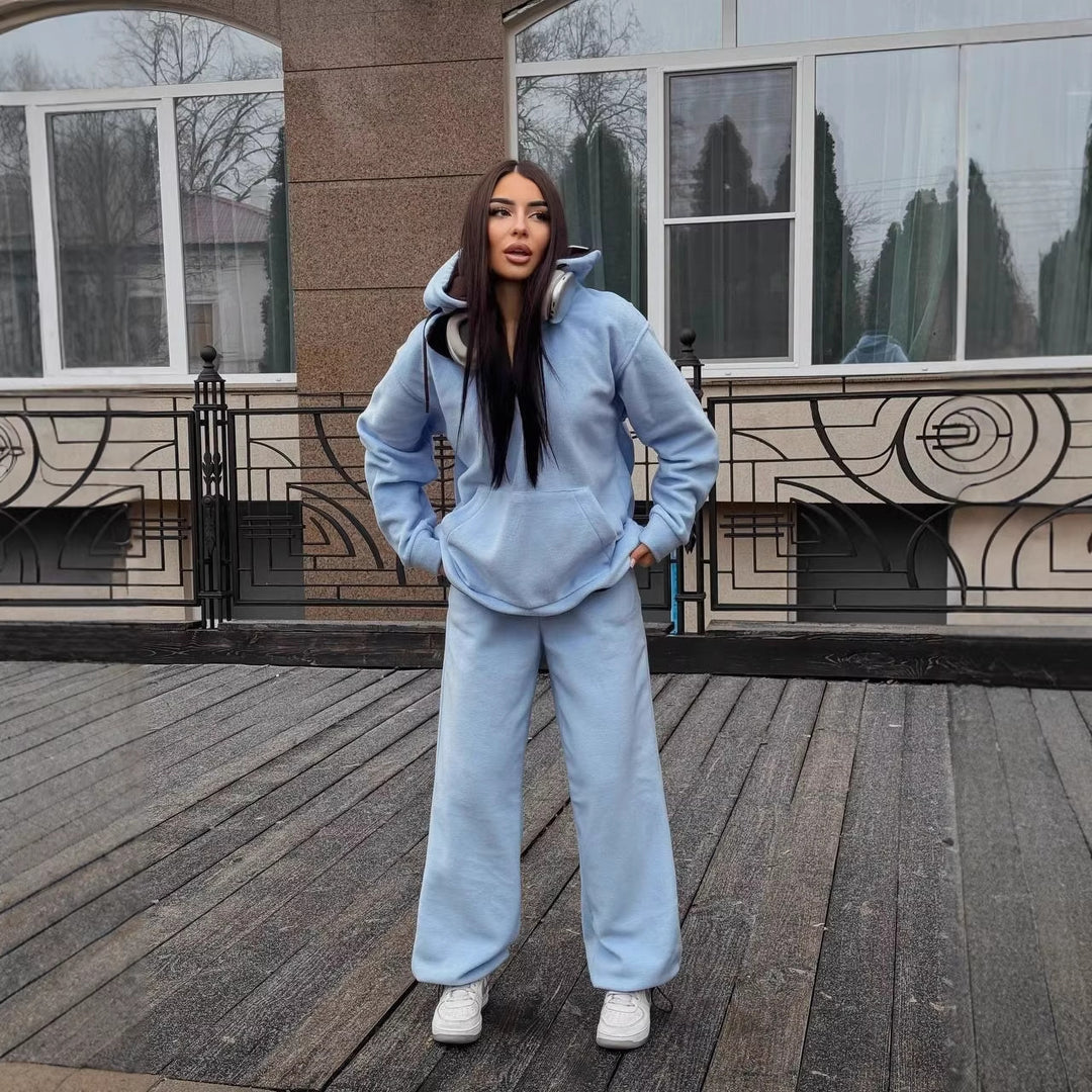 Women's fleece loungewear set with half front zip, lined hood and high cut comfort pants Mune Fashion