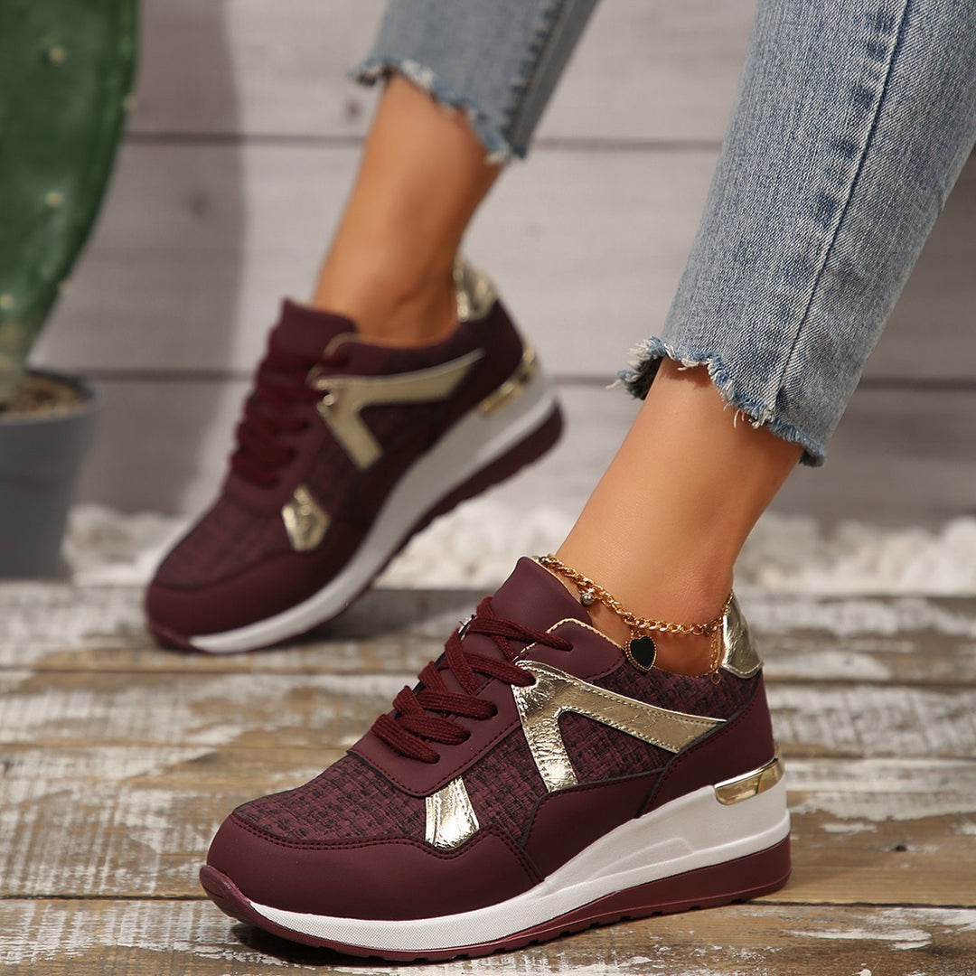 Ladies sporty wedge sneakers with padded memory footbed and elegant metallic accents Mune Fashion