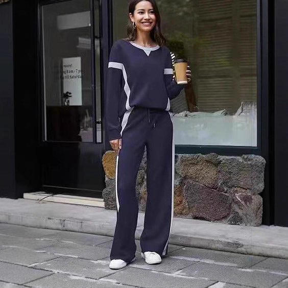 Women nan sports Lounge set with oversized sweatshirt, palazzo pants and side contrast stripes Mune Fashion