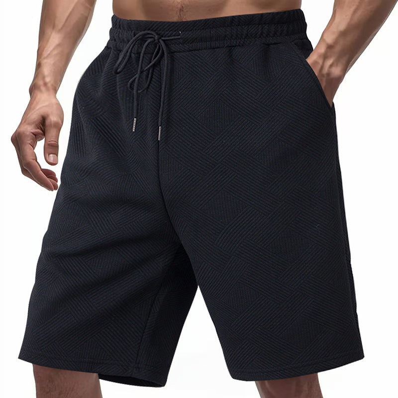 Men's knee-length textured swim shorts with elastic drawstring waistband and side pockets Mune Fashion