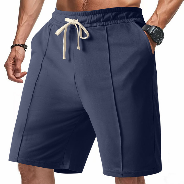 Men's knee-length relaxed Bermuda shorts with flat crease, elastic drawstring waistband and side pockets Mune Fashion