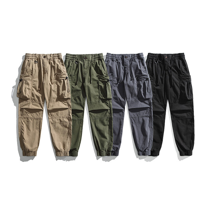 Men's military-inspired cargo pants with elastic tunnel drawstring waistband, flap and zipper pockets Mune Fashion
