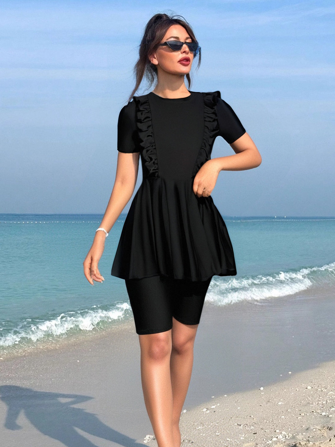 Women's beachwear with ruffle details Mune Fashion