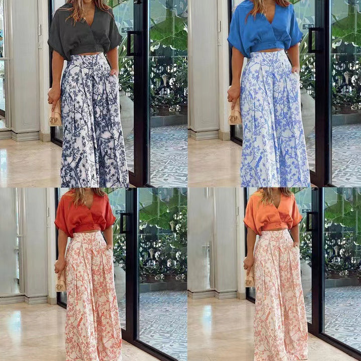Women Elegant high-waisted palazzo pants with wide leg, pleats and side pockets Mune Fashion