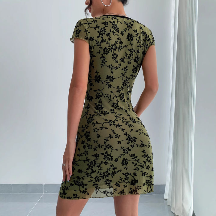 Women’s bodycon mini dress with deep V-neck, chiffon overlay and floral velvet look Mune Fashion