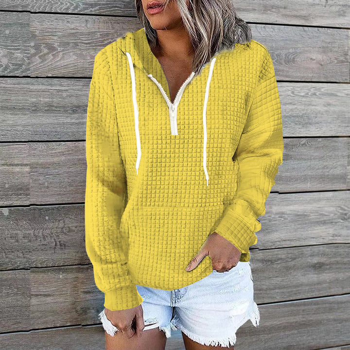 Women's waffle texture hoodie with half zip, kangaroo pocket, and casual oversized cut Mune Fashion
