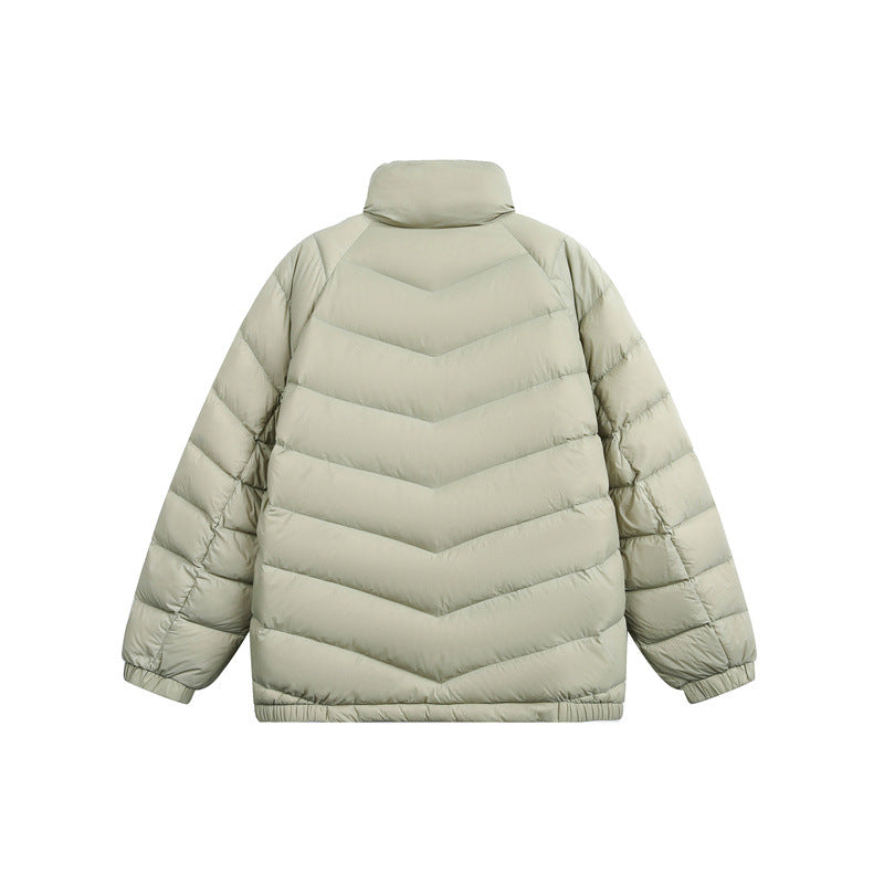 Unisex Short cut padded jacket in boxy fit with chevron quilting and high collar Mune Fashion