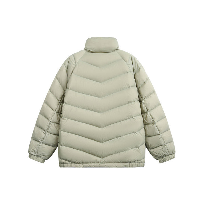 Unisex Short cut padded jacket in boxy fit with chevron quilting and high collar Mune Fashion