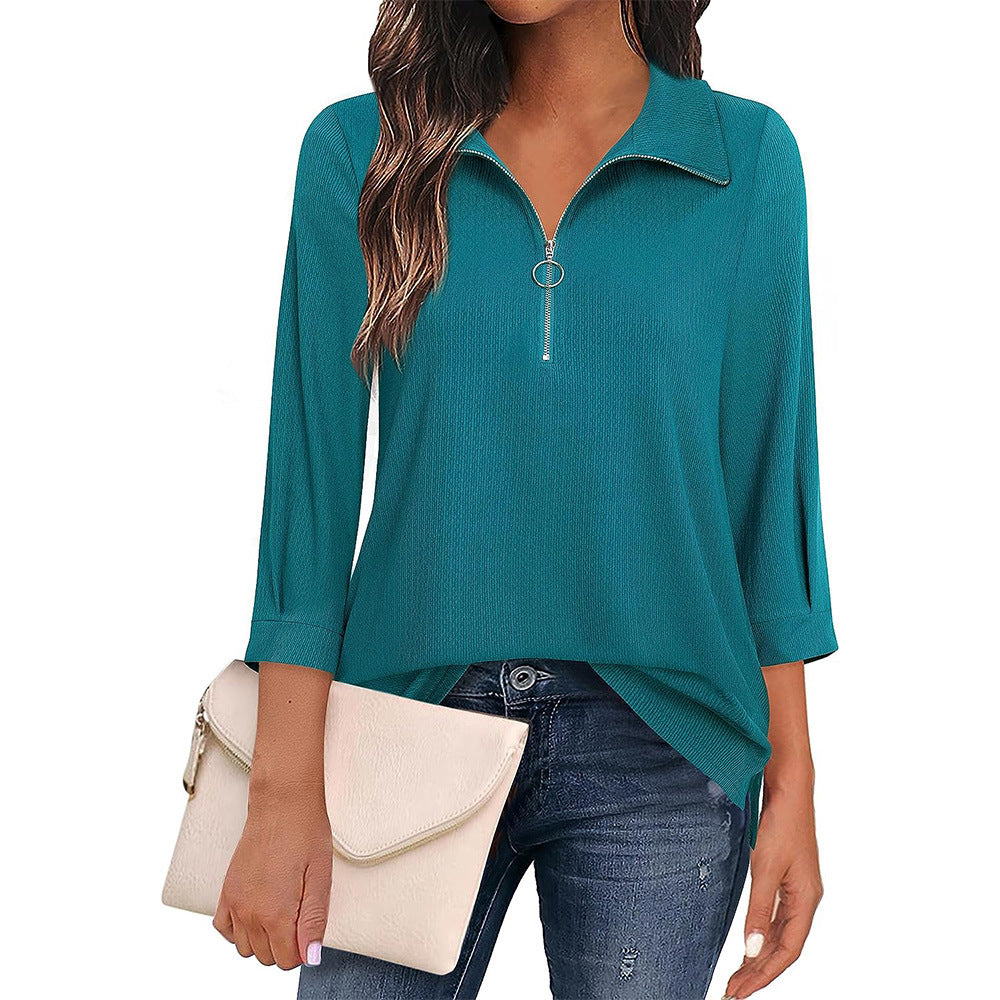 Women's casual blouse with zip collar, three-quarter sleeves, and flared hem Mune Fashion