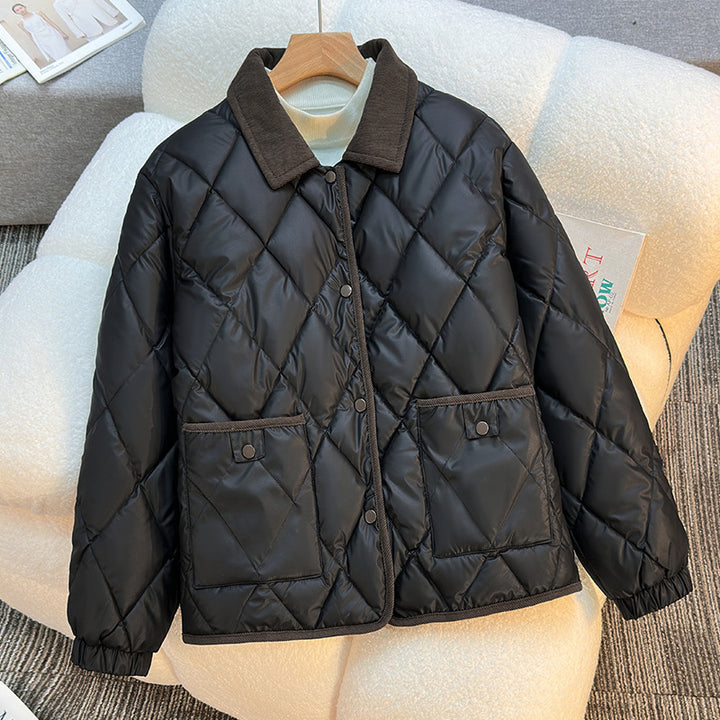 Women’s short quilted jacket with diamond stitching, cord collar, and flap pockets Mune Fashion