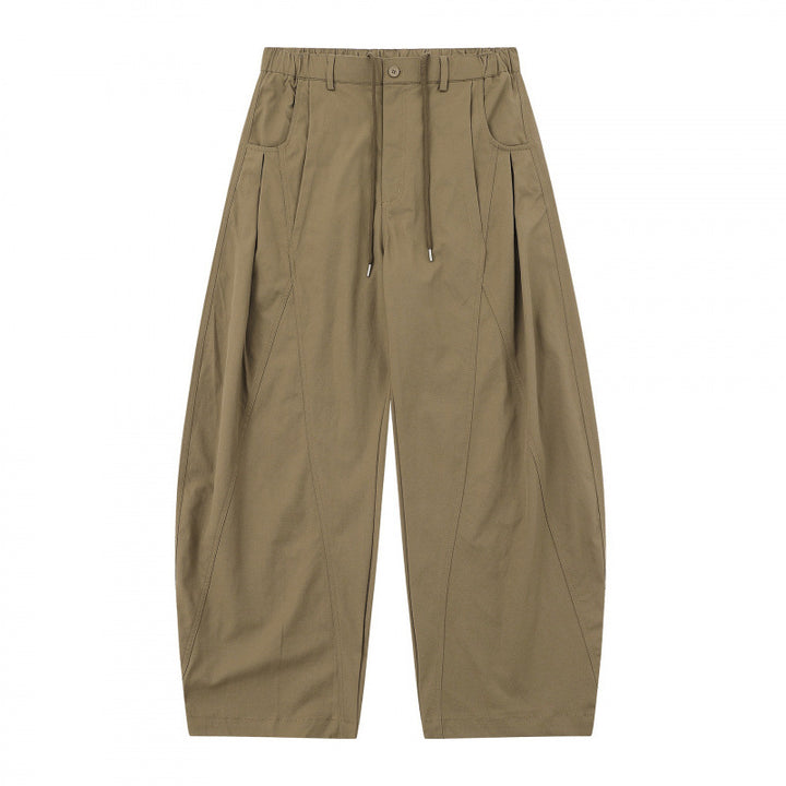 Women's wide balloon pants with drawstring waistband, pleats, and patch side pockets Mune Fashion