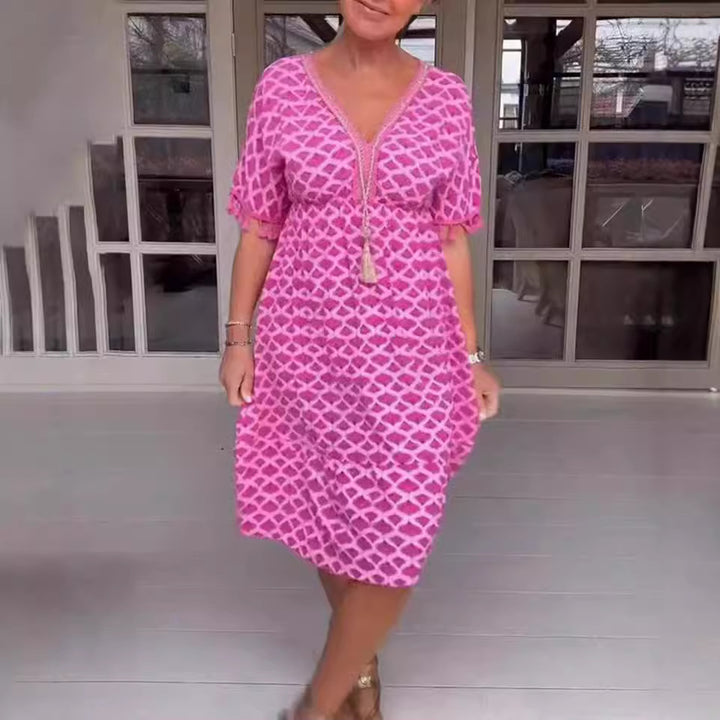 Women's casual V-neck beach dress with tassel tie and ruffle skirt Mune Fashion