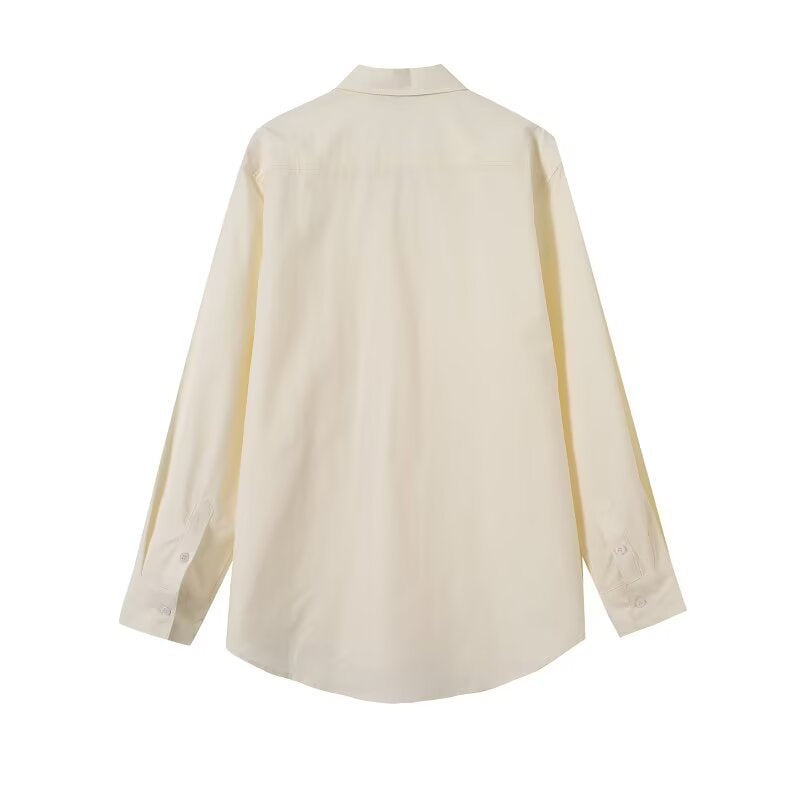 Women loose-fitting shirt blouse made of flowing material with continuous button placket Mune Fashion