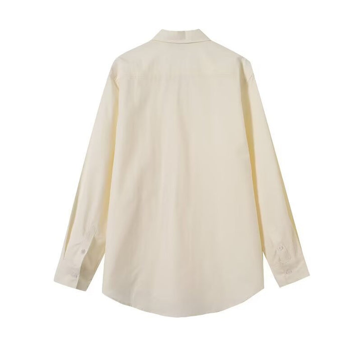 Women loose-fitting shirt blouse made of flowing material with continuous button placket Mune Fashion