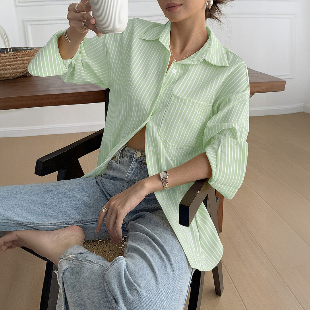Women's oversized shirt blouse with boxy cut, breast pocket, and rounded hem Mune Fashion