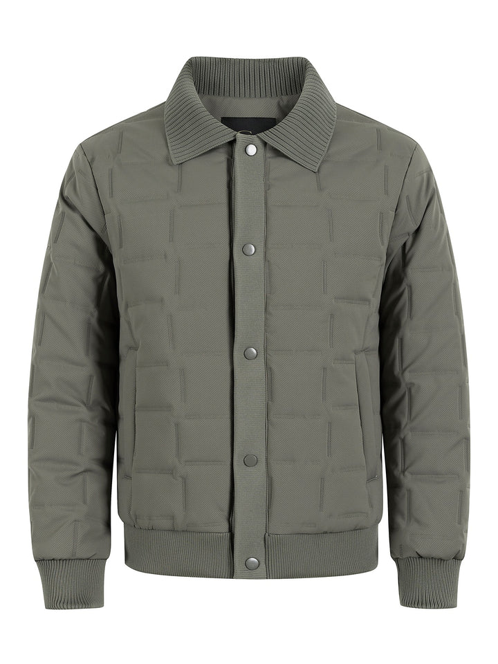 Men's short-cut quilted bomber jacket with ribbed collar, snap button placket, and geometric quilt Mune Fashion