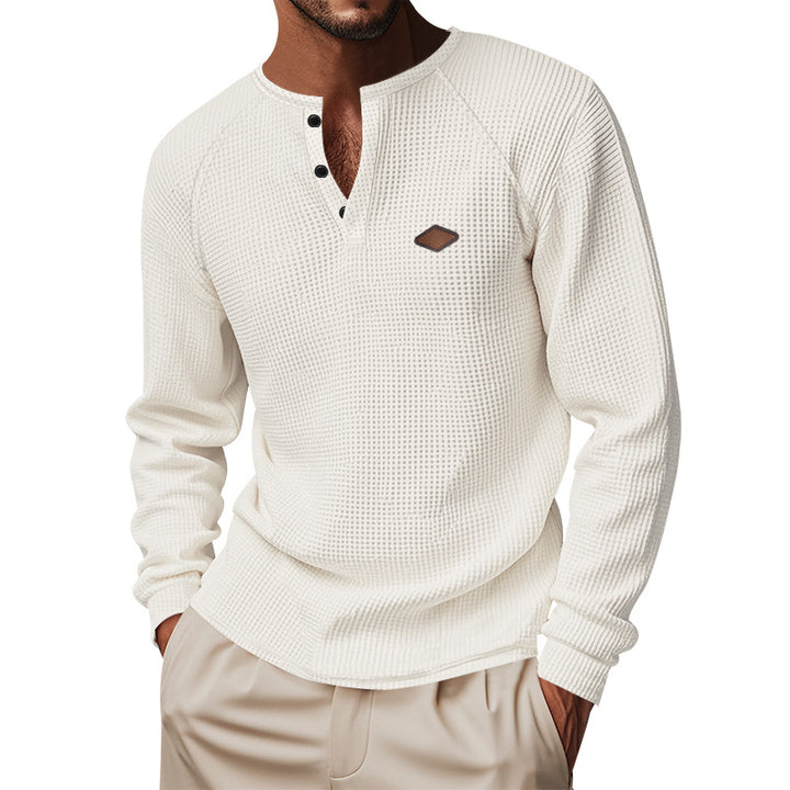 Men's structured long-sleeve shirt with short button placket, raglan sleeves, and subtle logo application Mune Fashion