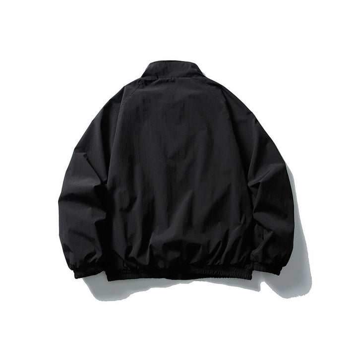 Unisex Lightweight water-repellent windbreaker with stand-up collar, raglan sleeves, and elastic hem Mune Fashion