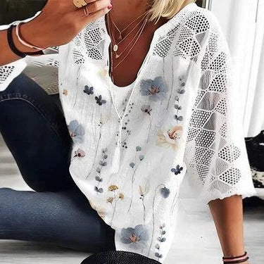 Women's V-neck tunic with lace-knit sleeves and subtle watercolor floral print Mune Fashion