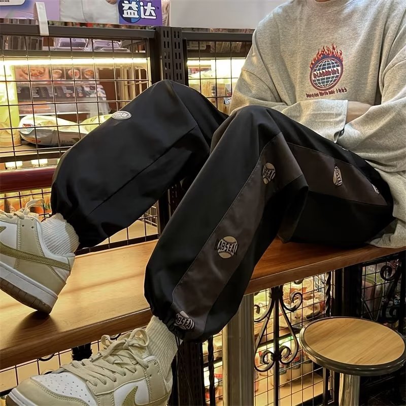 Men's fashionable sports pants with side graphic print Mune Fashion