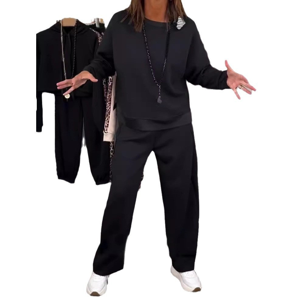 Women’s oversized jogging set with boxy sweatshirt and wide palazzo pants with decorative side stripe Mune Fashion