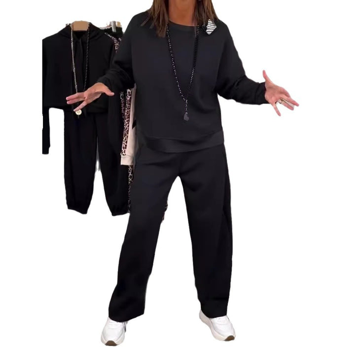 Women’s oversized jogging set with boxy sweatshirt and wide palazzo pants with decorative side stripe Mune Fashion