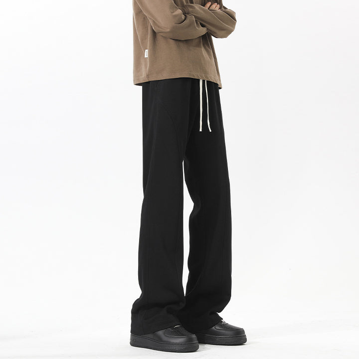 Men's oversized sweatpants in baggy cut with drawstring and decorative seams Mune Fashion