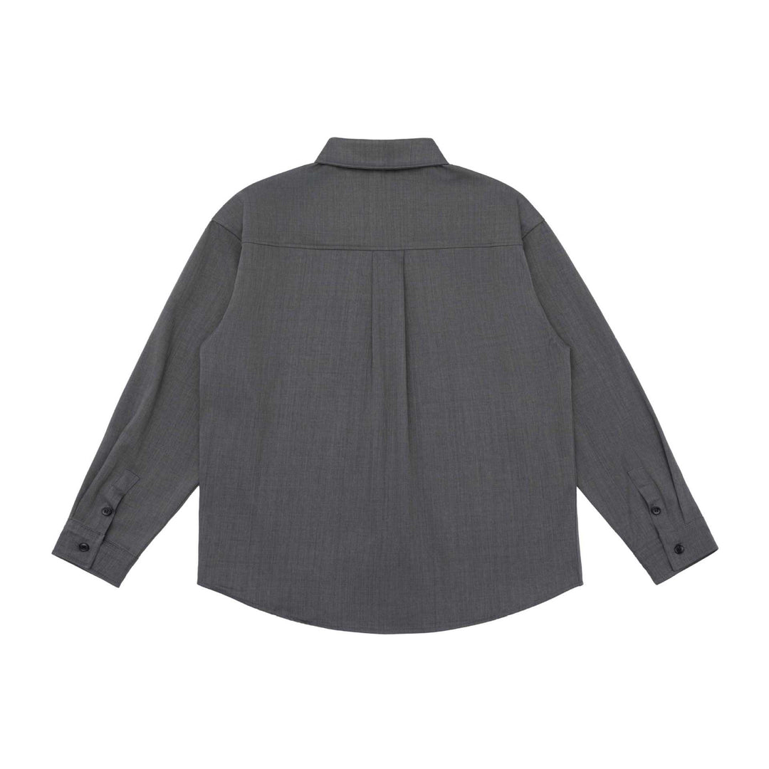 Unisex Oversize Shirt Jacket in a minimalist workwear style with rounded hem and chest flap pocket Mune Fashion