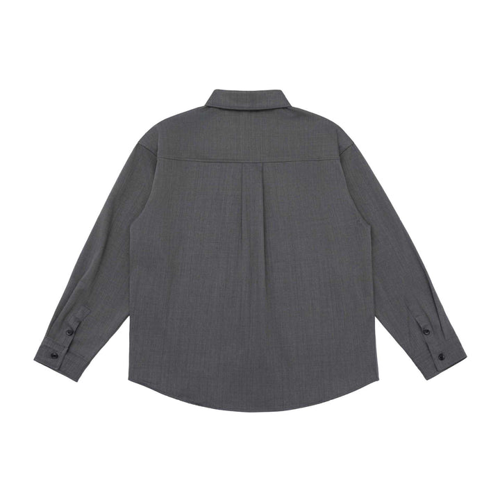 Unisex Oversize Shirt Jacket in a minimalist workwear style with rounded hem and chest flap pocket Mune Fashion