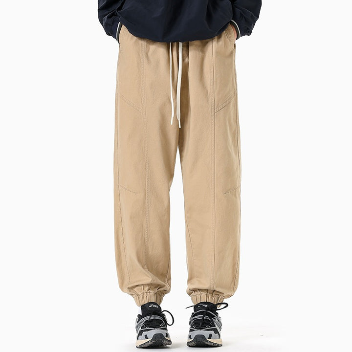 Men's Oversized Utility Jogging Pants made of sturdy cotton blend with drawstring waistband, side cargo pockets & ribbed cuffs Mune Fashion