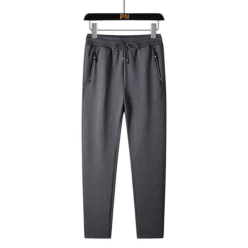 Men's thermo fleece jogging pants with brushed inner side, reflective zipper pockets and drawstring waistband Mune Fashion