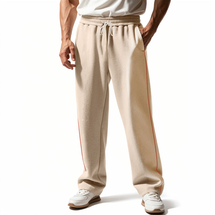 Men's casually fitting sweatpants with side decorative seam, elastic comfort waistband, and deep side pockets Mune Fashion