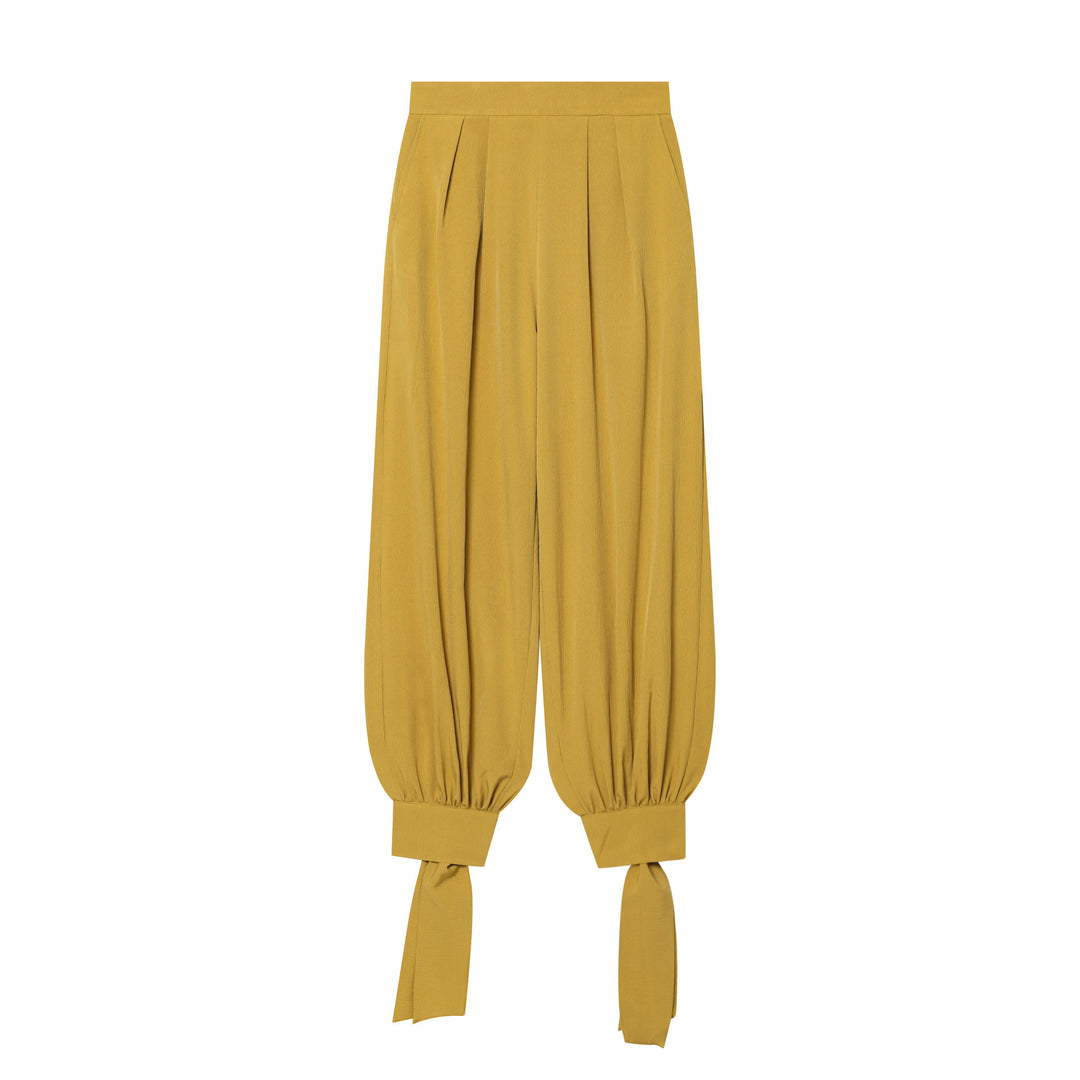 Women’s harem pants with high waistband, pleated folds and knotted cuffs Mune Fashion