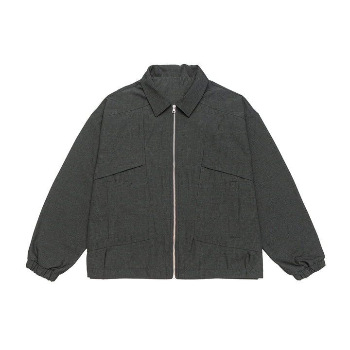 Unisex short jacket in boxy cut with shirt collar, visible metal zipper and utility patch pockets Mune Fashion